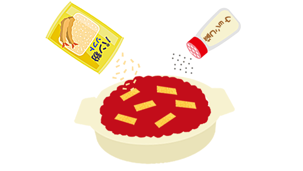 ピザ用ソースをご飯にかけ、チーズとパン粉を振りかけた後、塩コショウで調味する